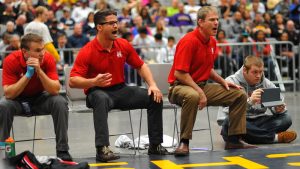 Three coaches yelling