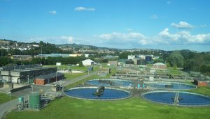 Outdoor photo of many circular pools and other structures