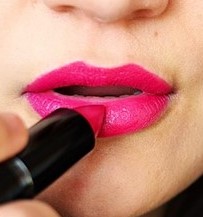 Photo of a women's mouth and lipstick