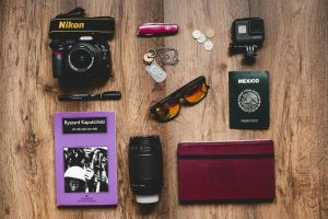 Camera, Book, Passport, Sunglasses.