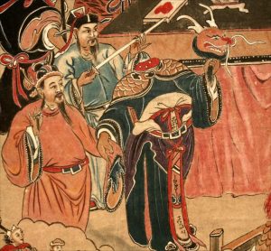 Detail of another painting showing emperor Taizong on the left, wearing the imperial yellow robe, standing next to the beheaded River Dragon. The dragon holds his head high with his left hand, with his right hand he grasps Taizong's arm to drag him to the court of the kings of hell.